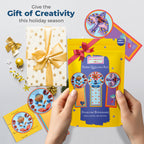 Paper quilling kit with colorful bookmarks and decorative elements on a light gray background.
Gift-ready paper quilling kit presented with festive ribbon and packaging.
