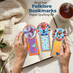 Beginner Folklore Bookmarks Paper Quilling Kit with colorful bookmarks and a cup of tea on a light surface.
Finished folklore quilled bookmarks placed on open book, emphasizing handmade detail.
